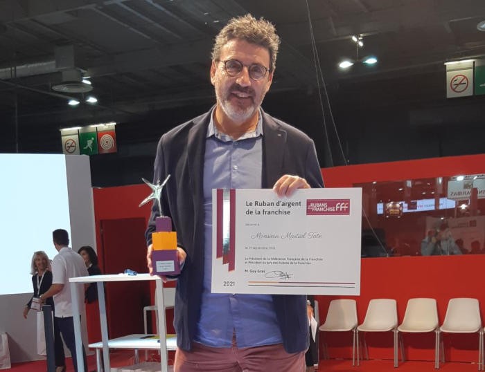 Le franchisé AXEO Services de Grenoble reçoit le Ruban d’Argent de la FFF